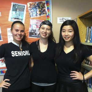 Seniors Taylor O'Dell, Jenna Thyne, and Catherine Zhang showing their school spirit on "blackout" day