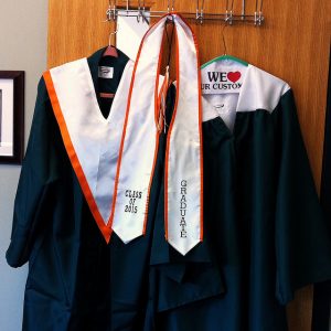 Administration has given the Class of 2015 the opportunity to vote for the type of green graduation gown that they like most. Photo by Ashley Olafsen.