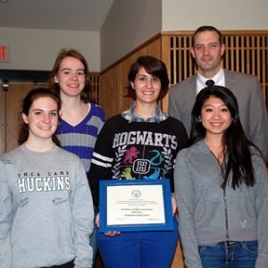 HHS Press staff members, Sarah Cavanaugh, Maria Moreno, Casey Rector, Julia Li, share Suffolk University Award with Principal Bishop.  Photo by Andrew A. Dickason.