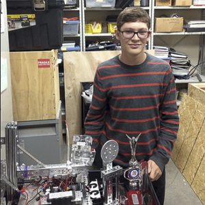 Evan Goldstein, junior, is a three year member and co-leading engineer of the Robotics Club and is working with his team to design new robots for the 2014-2015 school year. Photo by Nikolai Saporoschetz.