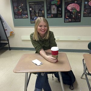 Lucy starts her day off regularly with Starbucks coffee. Photo by Shae Feather