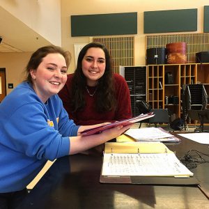 Cassie Clark and Emma Nigrosh, seniors at HHS, enjoy spending time at rehearsals to ensure they are prepared for various performances. Photo by Amanda Dings.