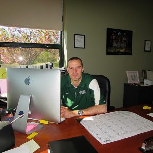 Principal Evan Bishop has been working at HHS for ten years during which time there has never been a senior prom. Photo by Victoria Esper.