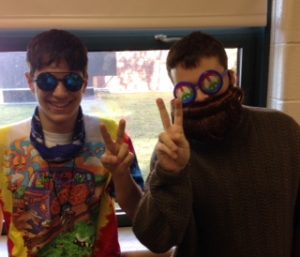 Blake Dobay and Trevor Perkins flash the peace sign on 60s day. Photo by Owen McNamara.