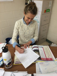 Foreign Language teacher Liza Lyons corrects homework during a prep period. Photo by Juliette Davis.