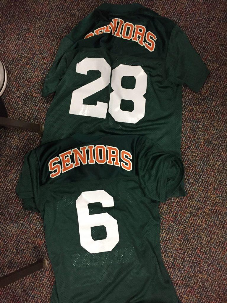 The players get new jerseys this year, green for the seniors and white for the juniors. Photo by Casey Palmer
