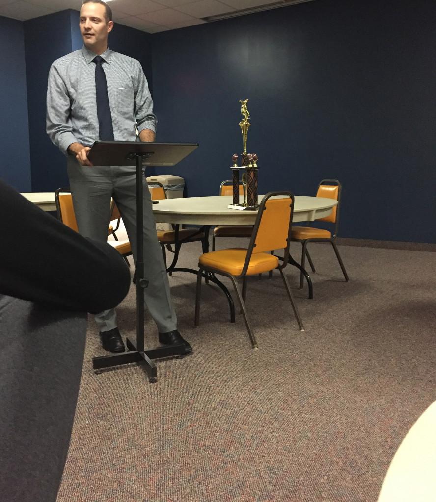 Principle Evan Bishop giving speech on Powder Puff Traditions. Photo by Casey Palmer.