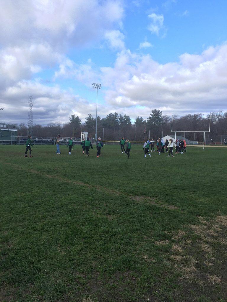 The senior girls begin their first practice in preparation for their game against the juniors. Photo by Emma Zack. 