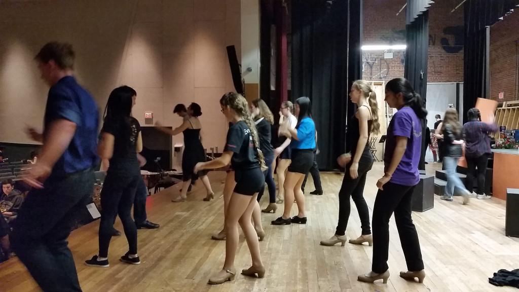 The cast rehearses one of the showâ€™s 13 dance numbers during rehearsal.