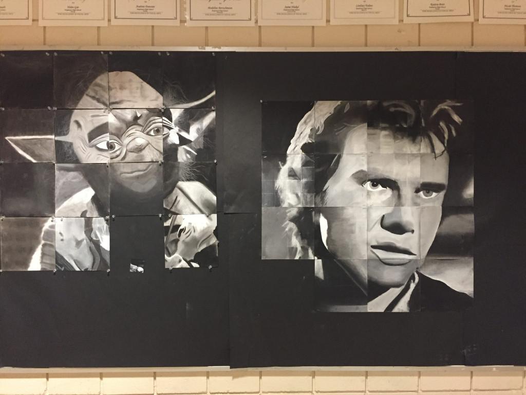 Portraits of Yoda and Han Solo, created by the Studio Art 1 class, hang in the art wing. Photo by Allison McNulty.