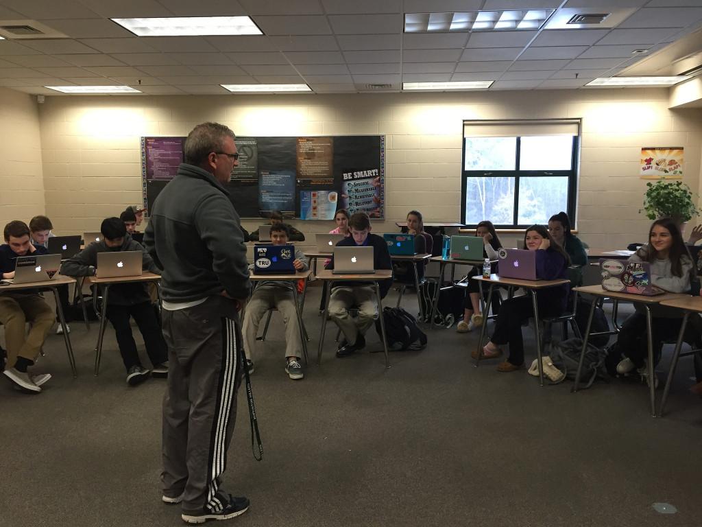 Mr. Hooker teaching one of his ninth grade wellness classes. Photo by: Julia Joshi and Brittany Power