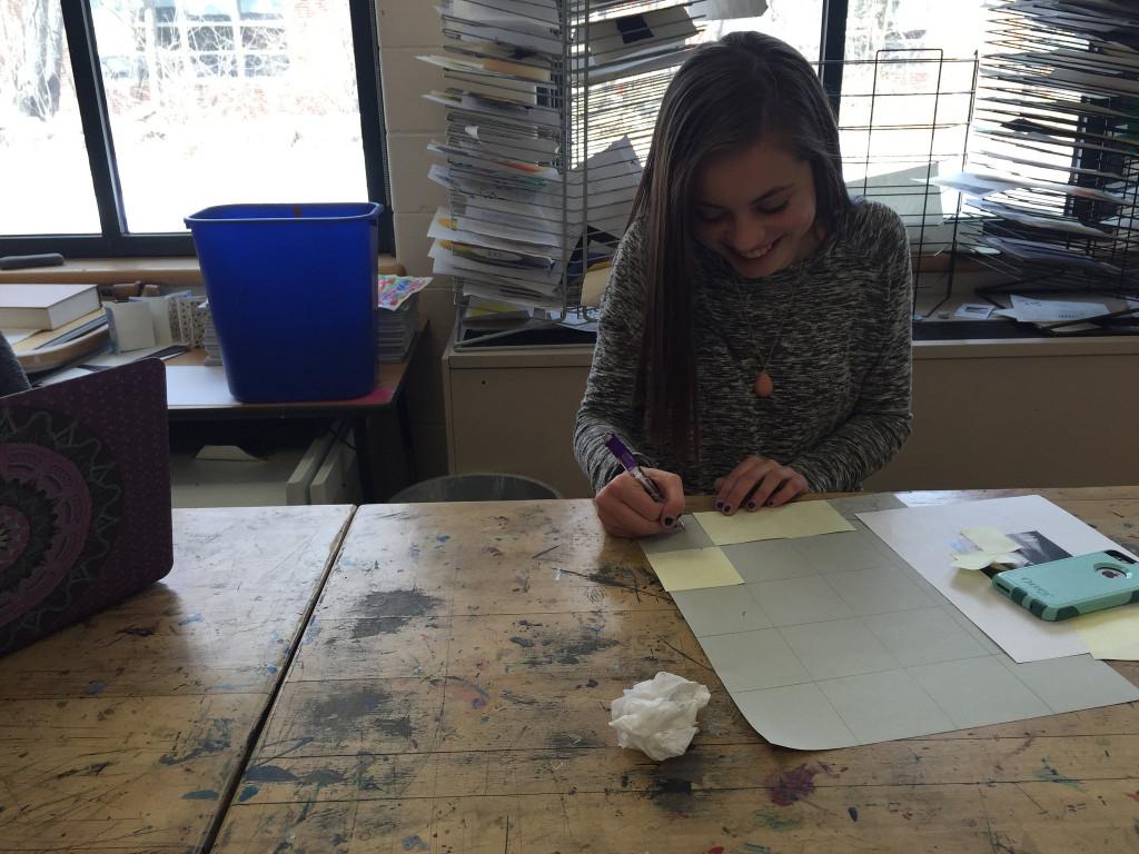 Freshman art student, Ciara Johnson, works on her self portrait in Studio Art 1. Photo by Casey Palmer. 