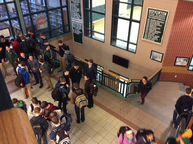 Students gather in the atrium in anticipation of the bell to ring for first period. Photo by Sarah Fromer.